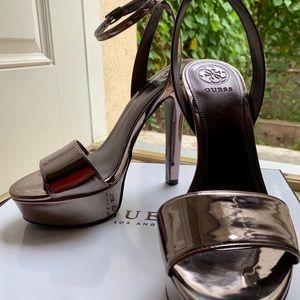 Brand new GUESS heels. Pewter color.
